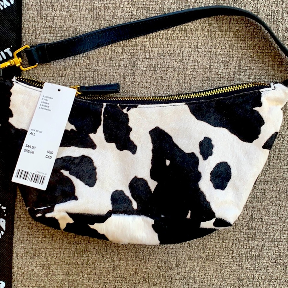 Never worn cow print purse tags still on